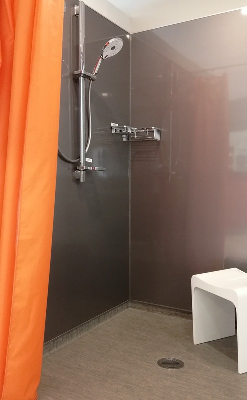 Seratone shower installation in a wet room bathroom by Bay Bathroom Design and Build in Tauranga