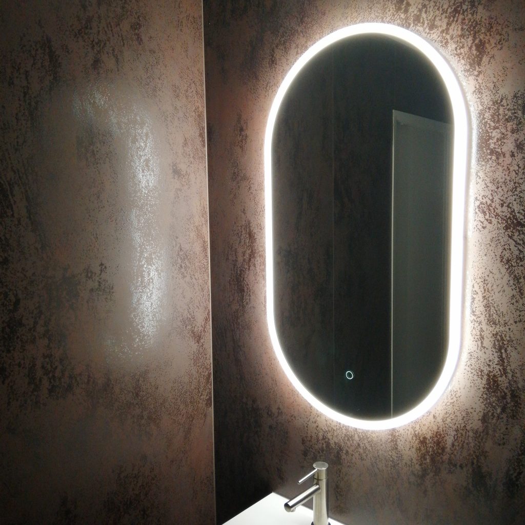 The Waterware Verre oval mirror in our Tauriko showroom